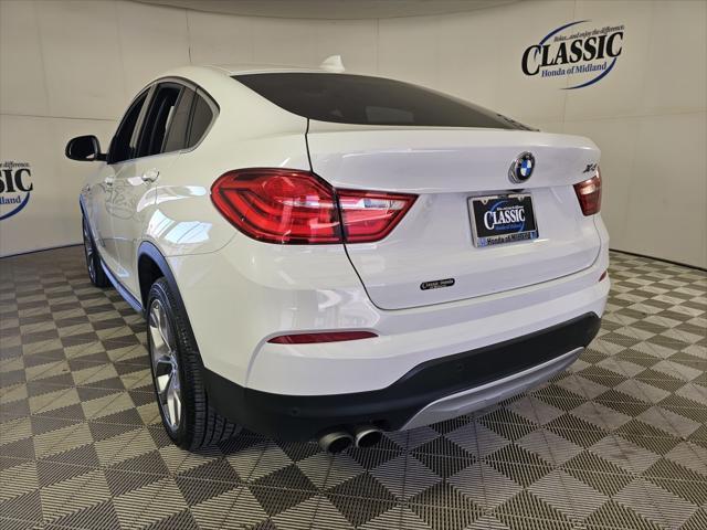 used 2018 BMW X4 car, priced at $25,500