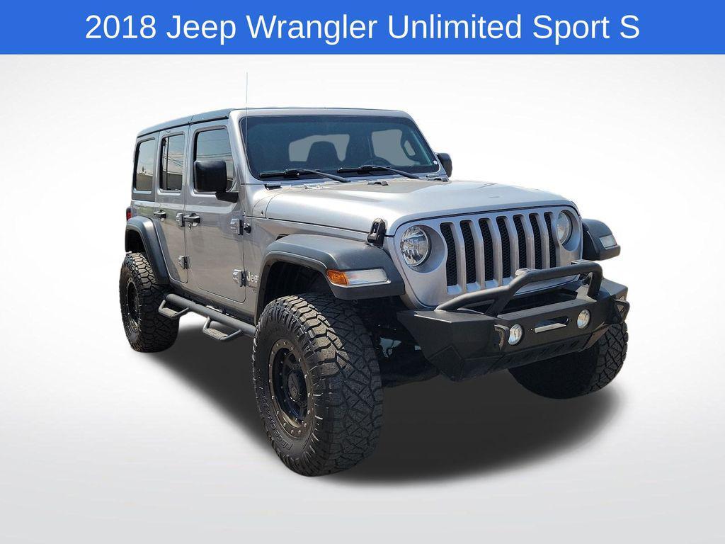 used 2018 Jeep Wrangler Unlimited car, priced at $26,340