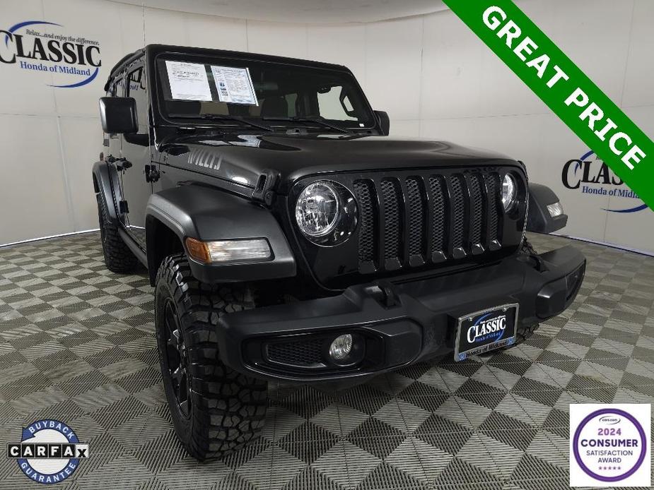 used 2022 Jeep Wrangler Unlimited car, priced at $32,700
