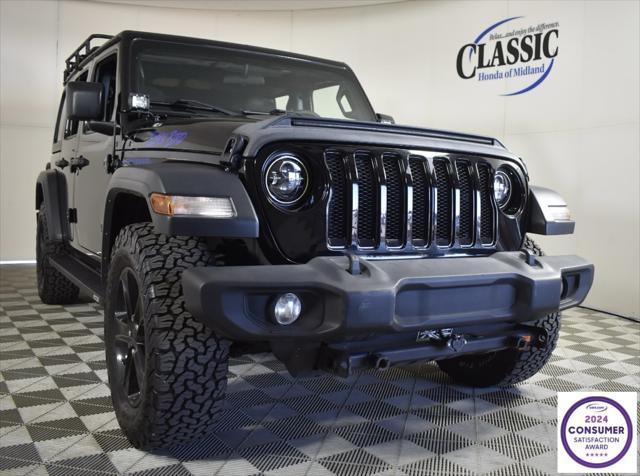 used 2023 Jeep Wrangler car, priced at $34,669