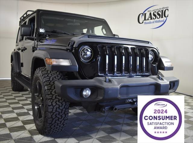 used 2023 Jeep Wrangler car, priced at $34,669