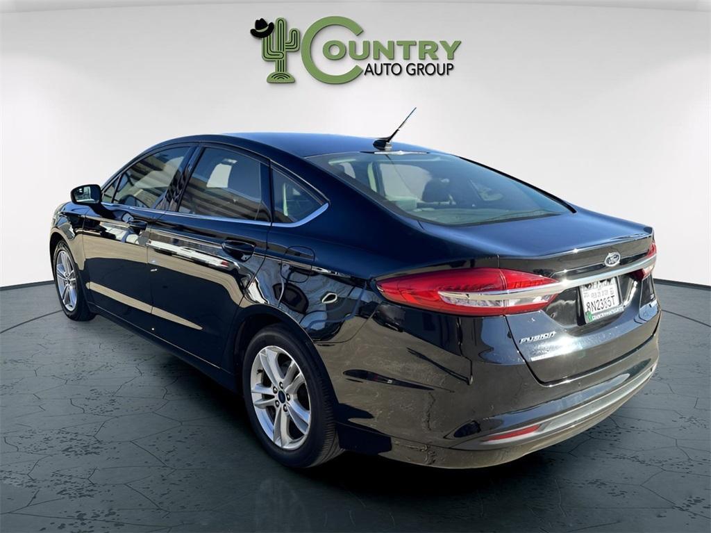 used 2018 Ford Fusion car, priced at $12,000