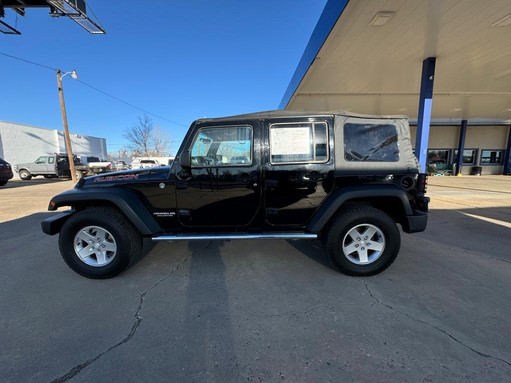 used 2011 Jeep Wrangler Unlimited car, priced at $15,000