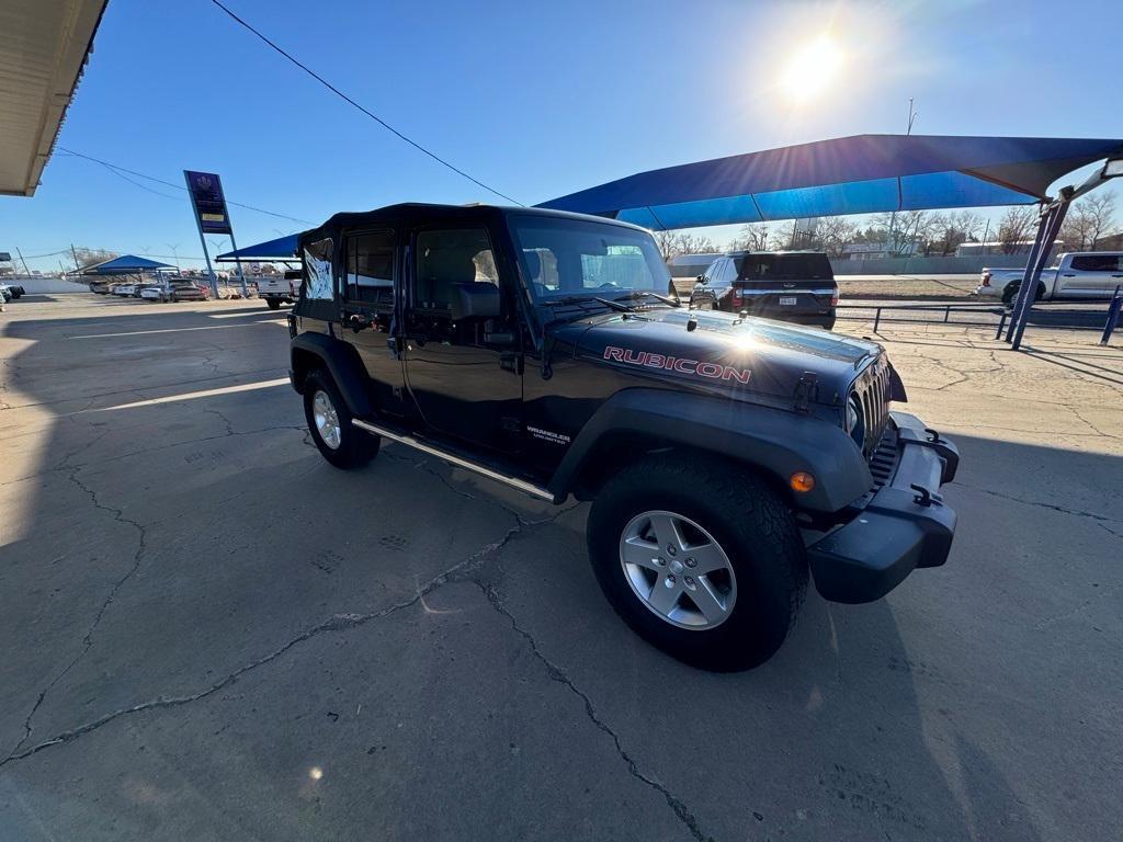 used 2011 Jeep Wrangler Unlimited car, priced at $15,000