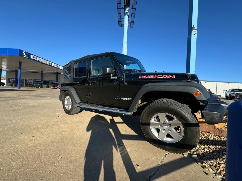 used 2011 Jeep Wrangler Unlimited car, priced at $15,000