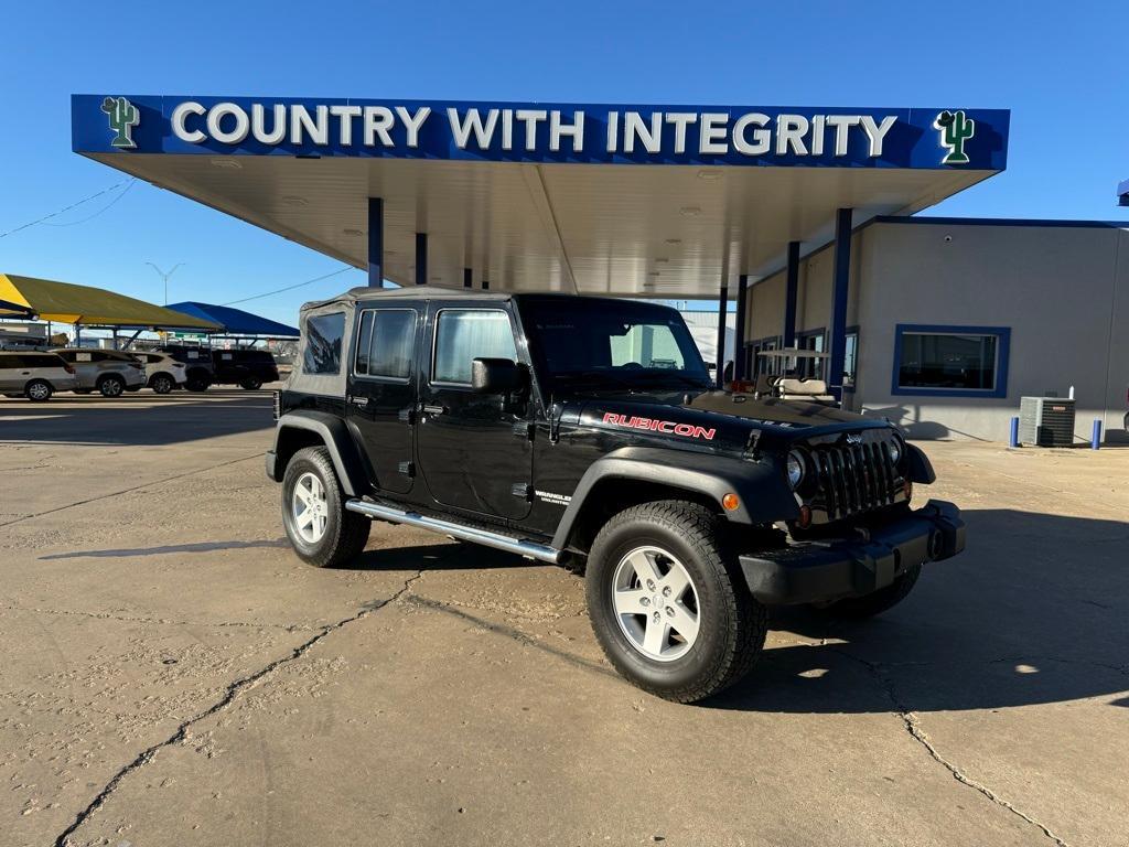 used 2011 Jeep Wrangler Unlimited car, priced at $15,000