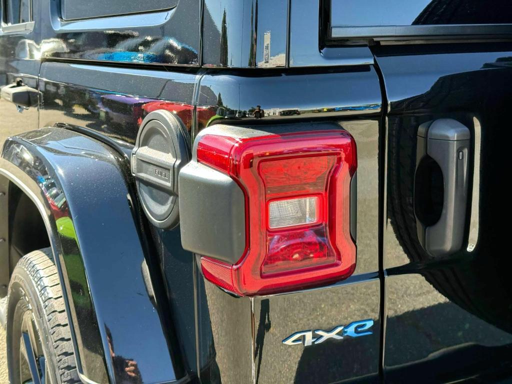 used 2022 Jeep Wrangler Unlimited 4xe car, priced at $30,598