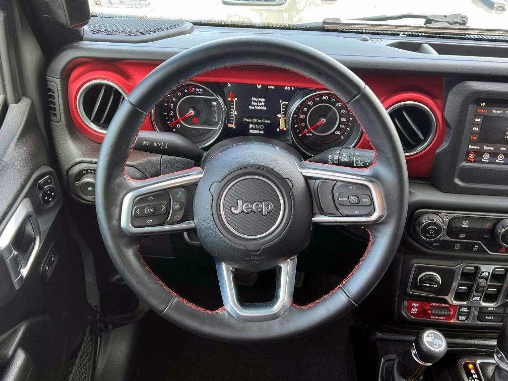 used 2021 Jeep Wrangler Unlimited car, priced at $39,566