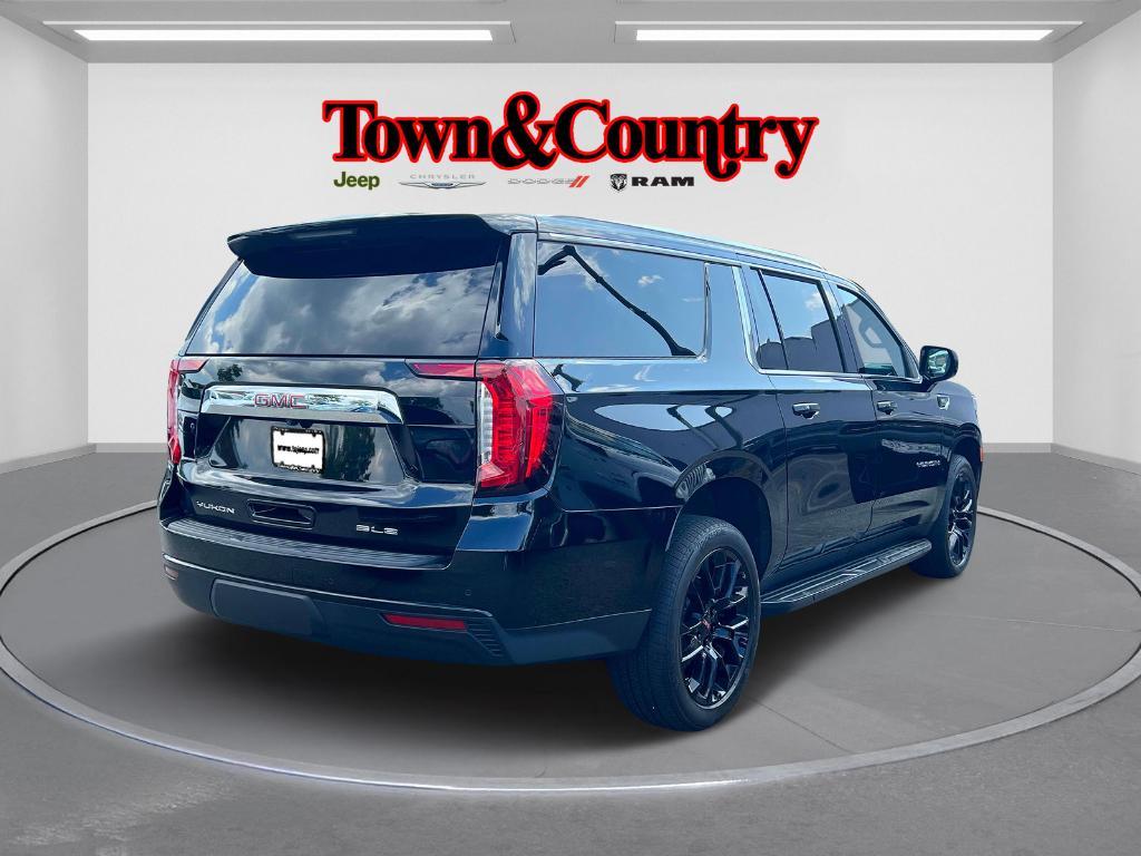 used 2023 GMC Yukon XL car, priced at $52,631
