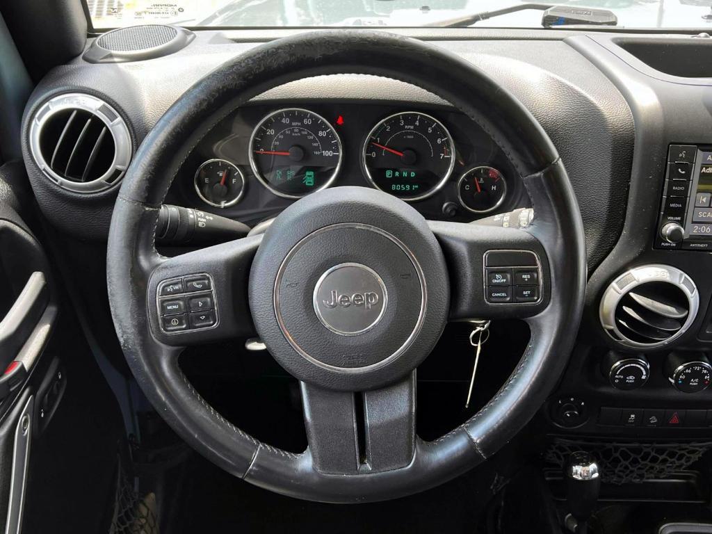used 2015 Jeep Wrangler Unlimited car, priced at $17,995