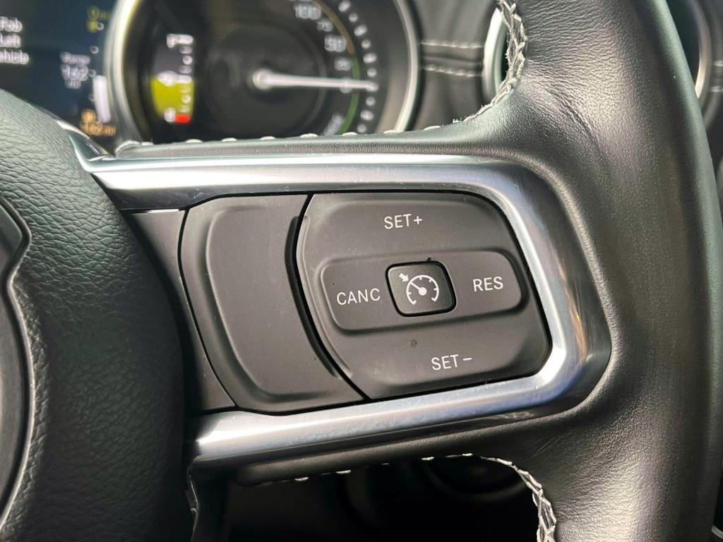 used 2023 Jeep Wrangler 4xe car, priced at $31,942