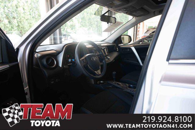 used 2013 Toyota RAV4 car, priced at $14,000