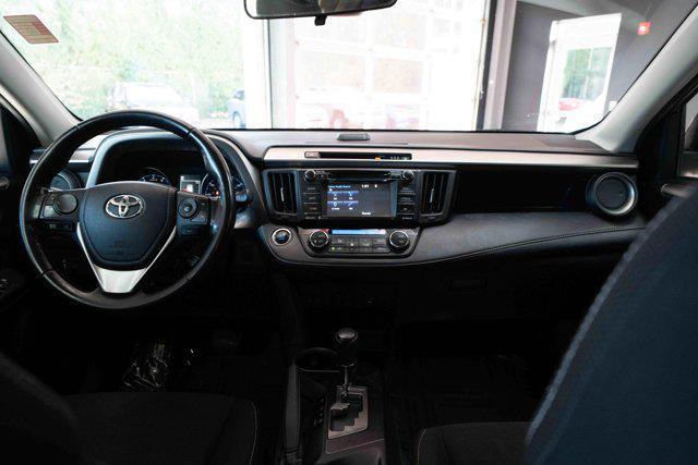 used 2018 Toyota RAV4 car, priced at $13,000
