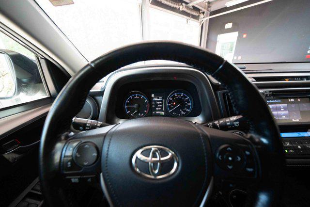 used 2018 Toyota RAV4 car, priced at $13,000