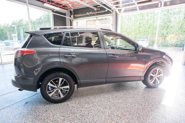 used 2018 Toyota RAV4 car, priced at $13,000