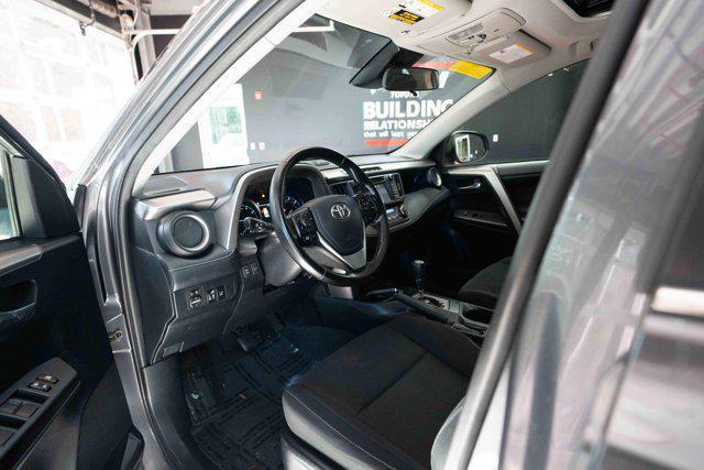 used 2018 Toyota RAV4 car, priced at $13,000