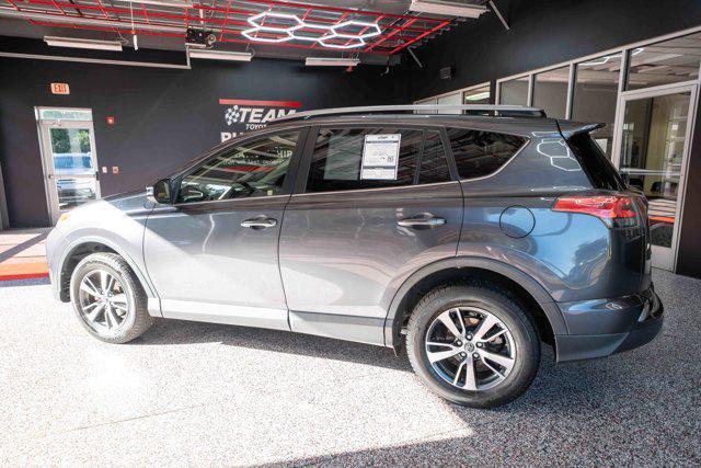 used 2018 Toyota RAV4 car, priced at $13,000