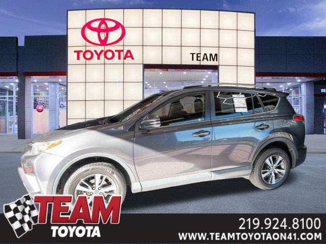 used 2018 Toyota RAV4 car, priced at $13,000