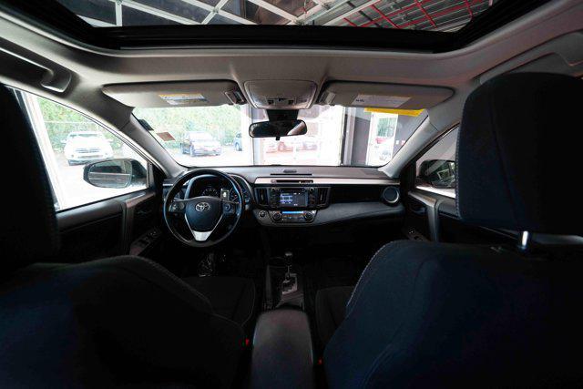 used 2018 Toyota RAV4 car, priced at $13,000