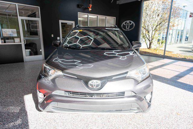 used 2018 Toyota RAV4 car, priced at $13,000