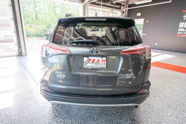 used 2018 Toyota RAV4 car, priced at $13,000