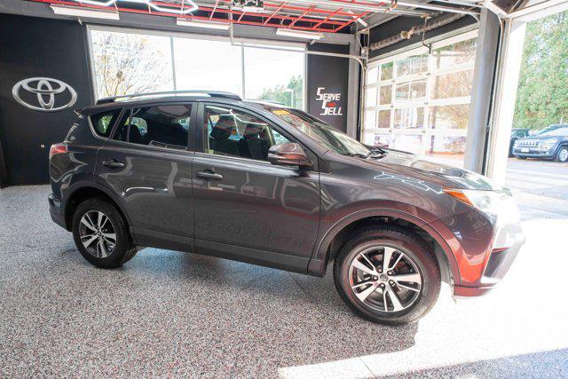 used 2018 Toyota RAV4 car, priced at $13,000