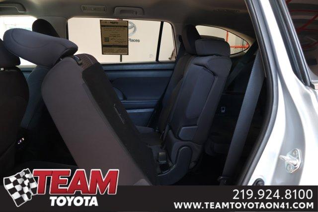 used 2021 Toyota Highlander Hybrid car, priced at $29,200