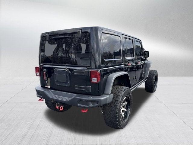 used 2013 Jeep Wrangler Unlimited car, priced at $29,995