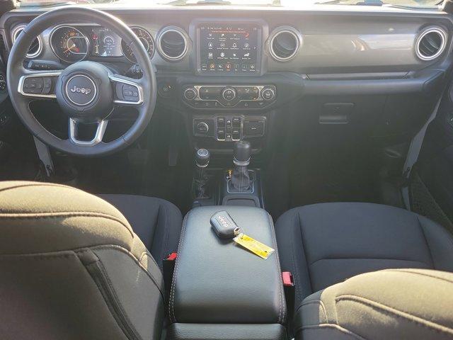 used 2023 Jeep Wrangler car, priced at $28,559