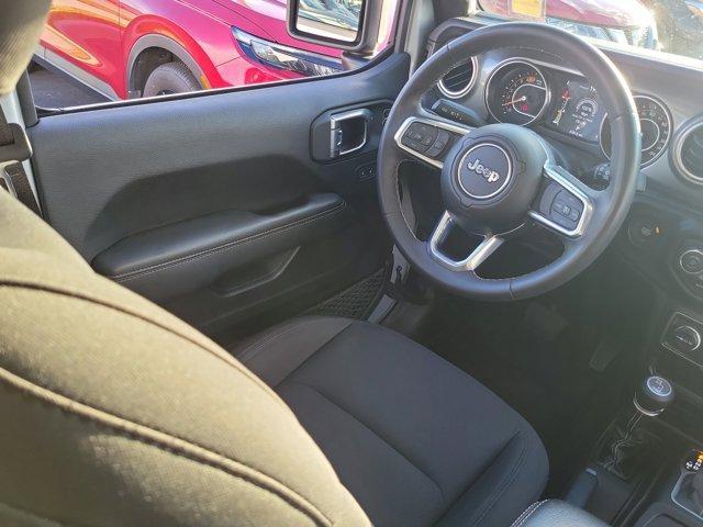 used 2023 Jeep Wrangler car, priced at $28,559