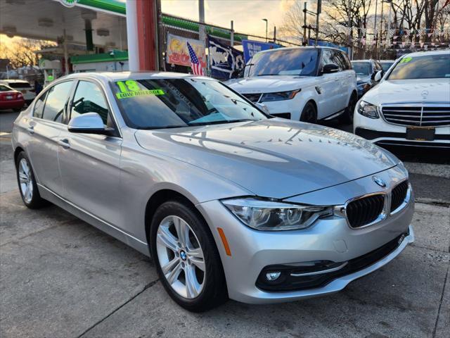 used 2018 BMW 330 car, priced at $18,995