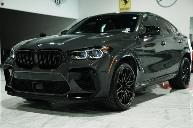 used 2022 BMW X6 M car, priced at $74,900