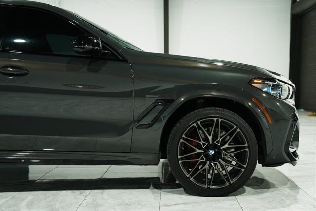 used 2022 BMW X6 M car, priced at $74,900