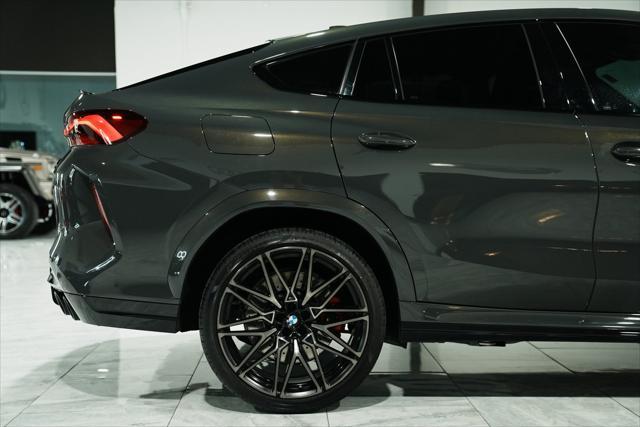 used 2022 BMW X6 M car, priced at $74,900