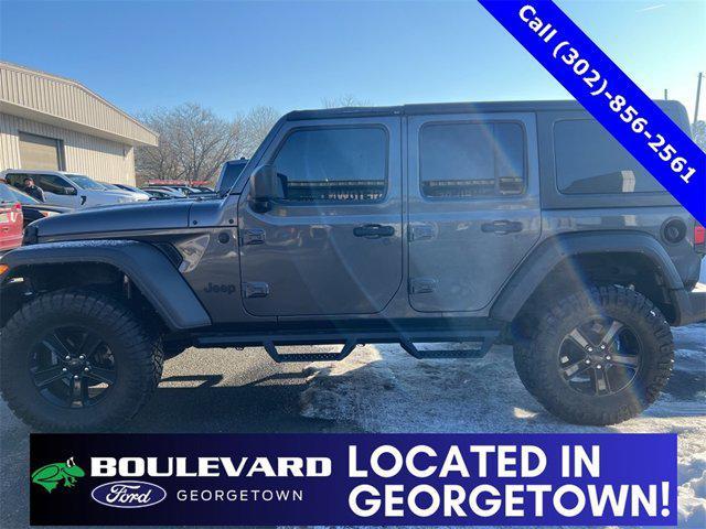 used 2021 Jeep Wrangler Unlimited car, priced at $27,400