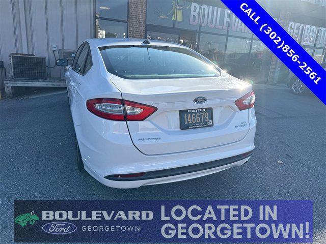 used 2015 Ford Fusion Hybrid car, priced at $7,000