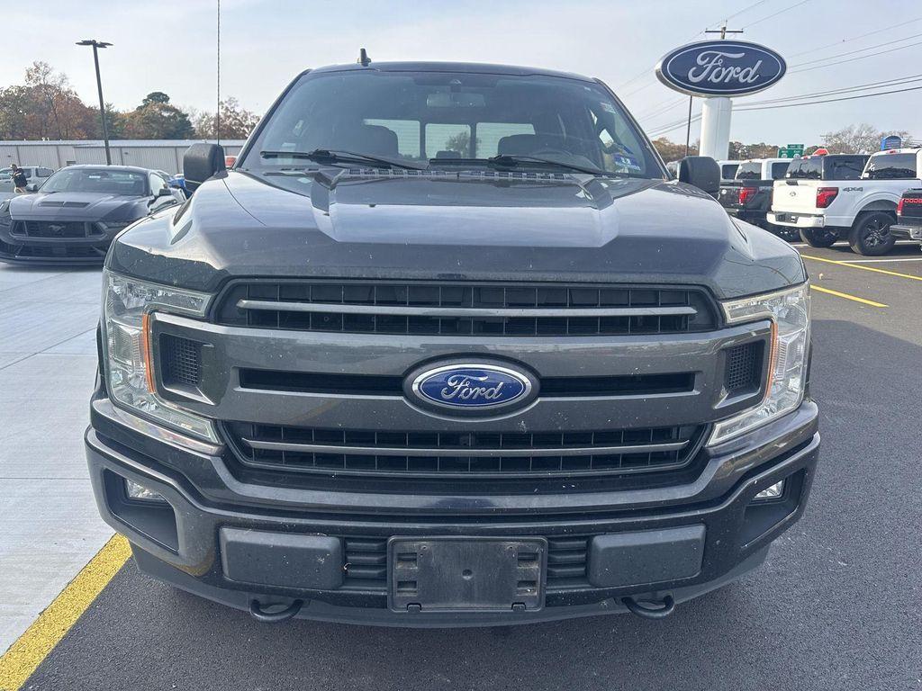 used 2019 Ford F-150 car, priced at $28,596