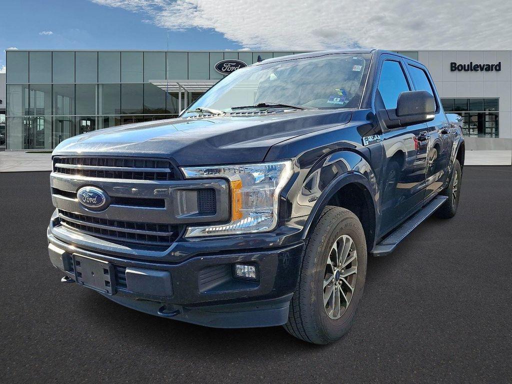 used 2019 Ford F-150 car, priced at $28,596