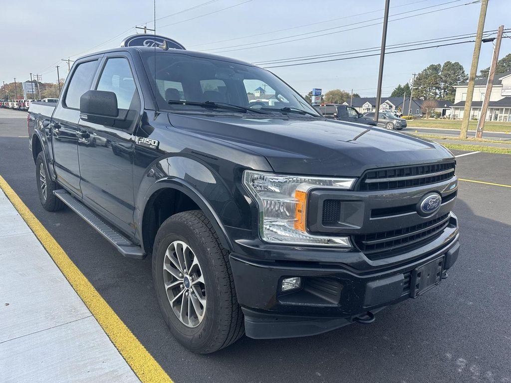 used 2019 Ford F-150 car, priced at $28,596