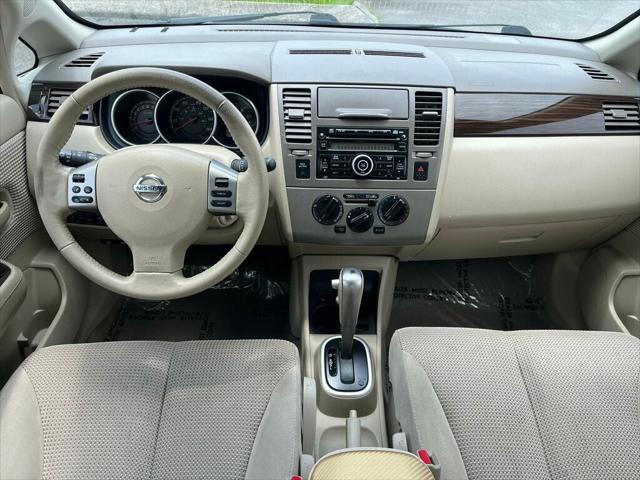 used 2010 Nissan Versa car, priced at $6,800