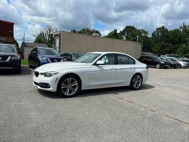 used 2018 BMW 330 car, priced at $17,999