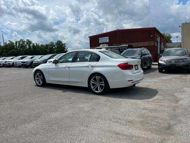 used 2018 BMW 330 car, priced at $17,999