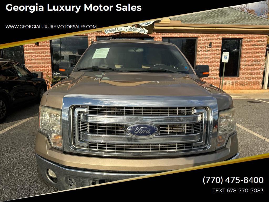 used 2014 Ford F-150 car, priced at $8,999