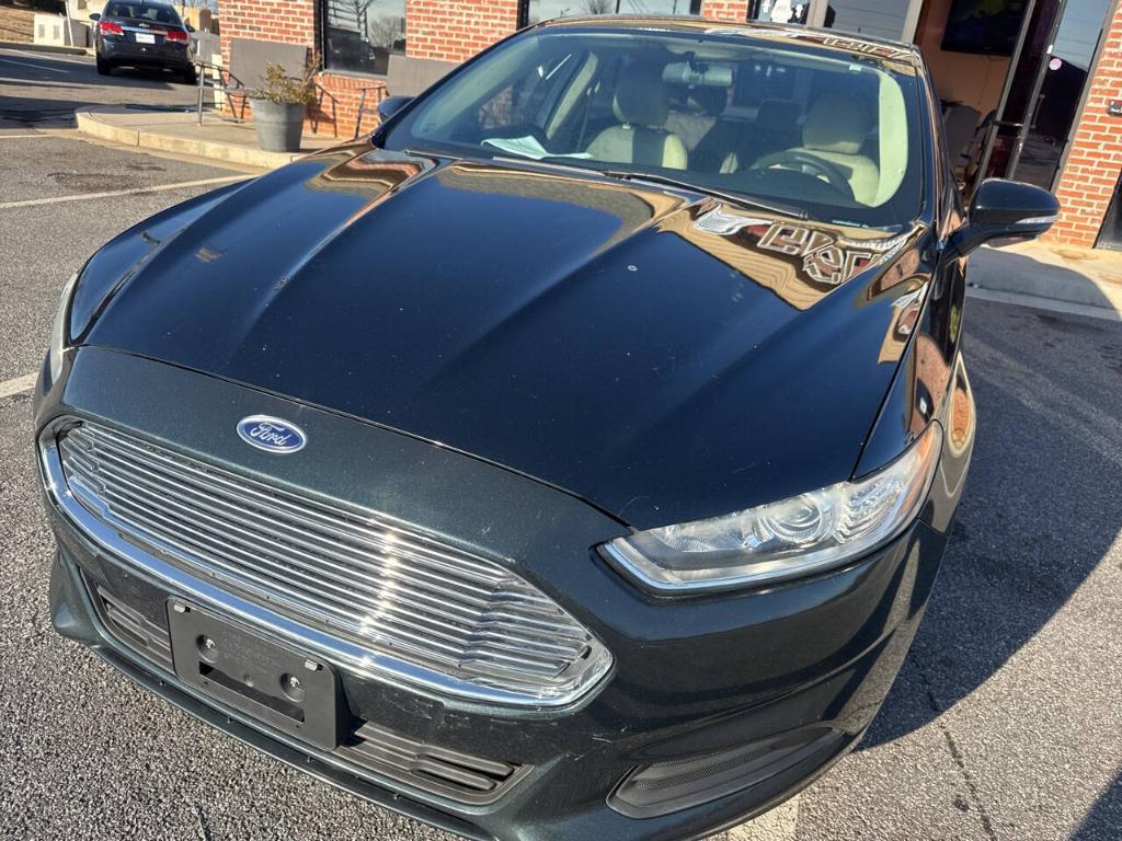 used 2014 Ford Fusion car, priced at $7,155