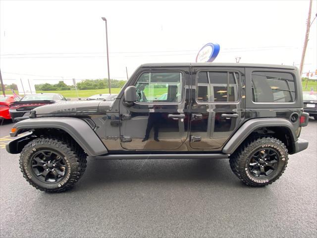 used 2021 Jeep Wrangler Unlimited car, priced at $27,400