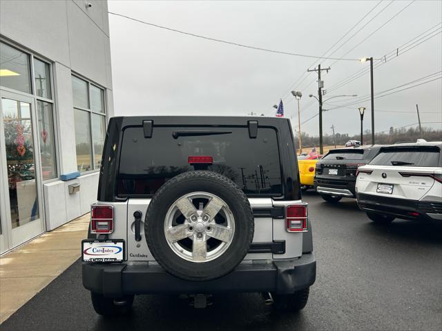 used 2012 Jeep Wrangler Unlimited car, priced at $16,999