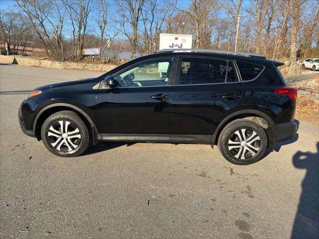 used 2015 Toyota RAV4 car, priced at $13,999