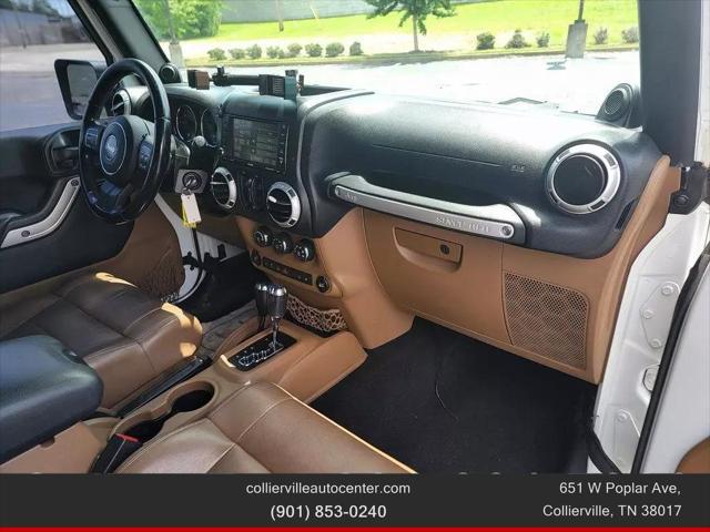 used 2012 Jeep Wrangler Unlimited car, priced at $14,499