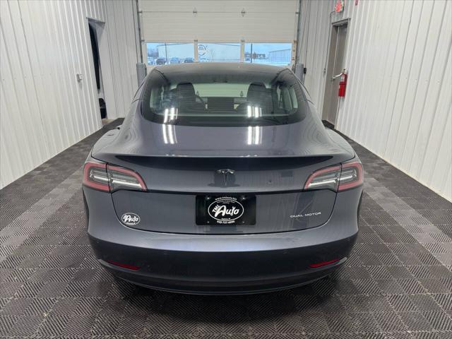 used 2022 Tesla Model 3 car, priced at $27,694