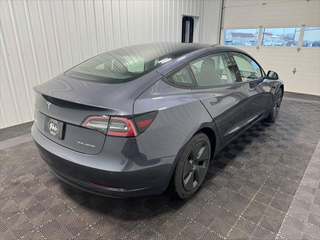 used 2022 Tesla Model 3 car, priced at $27,694